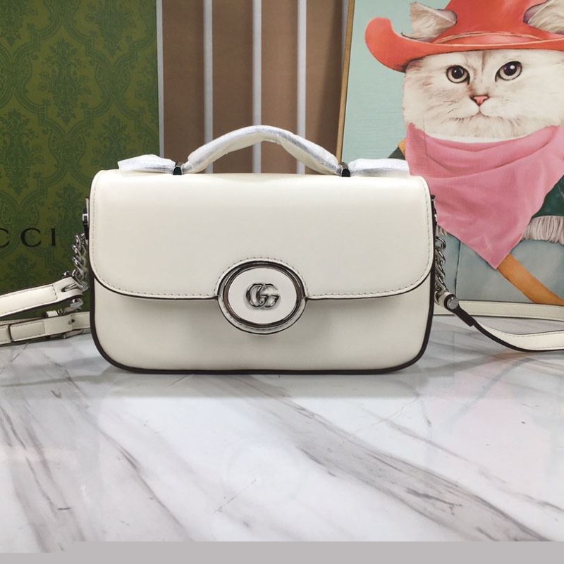 G*u*i top handle bags